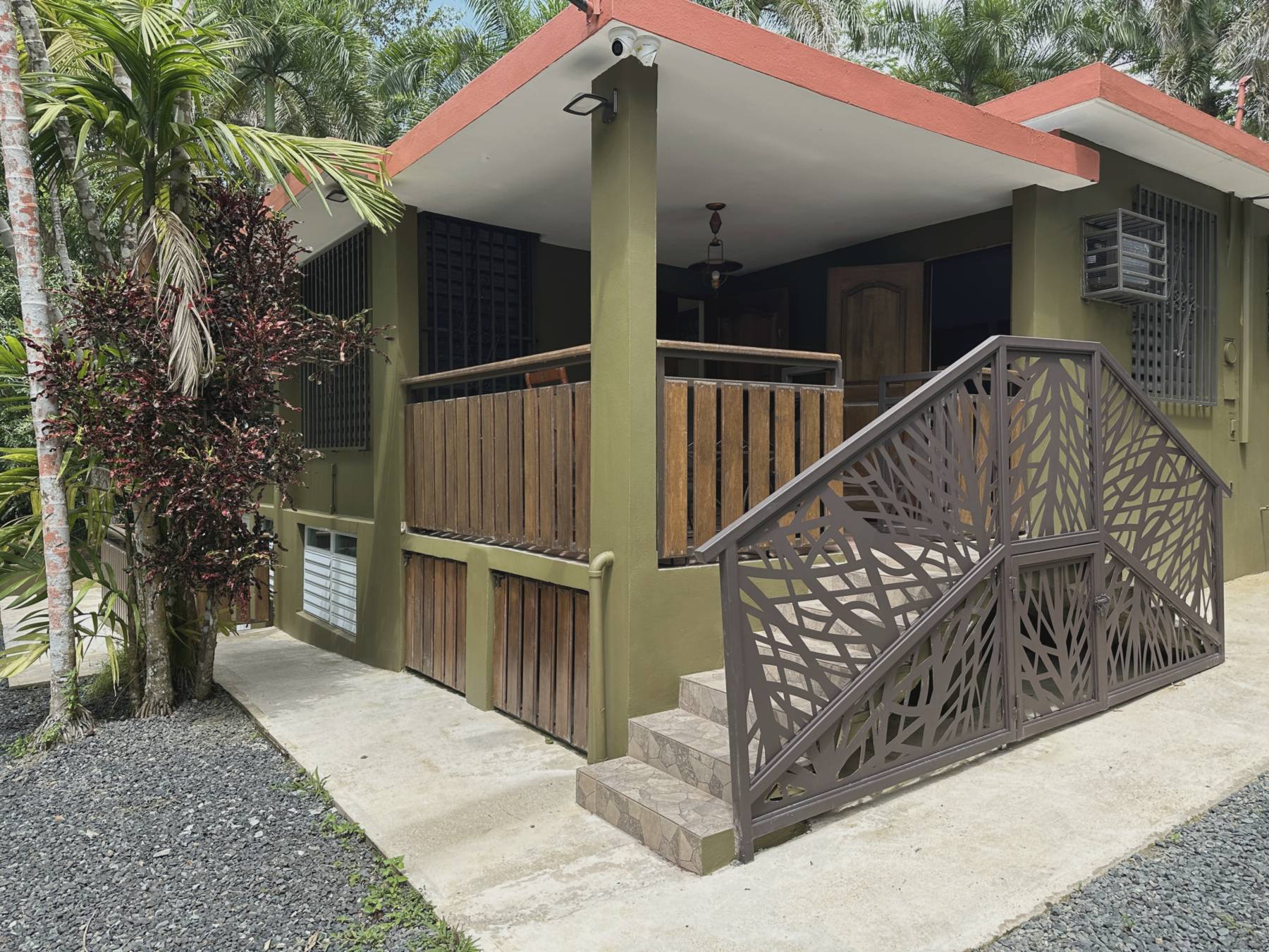 Entrance to Hacienda Yuké surrounded by tropical palms
